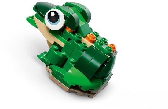 Groene LEGO-kikker met grote ogen en een bruine buik.