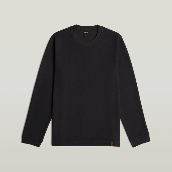 Zwarte sweater met ronde hals en wafeltextuur, inclusief een klein oranje G-Star label onderaan de zoom.