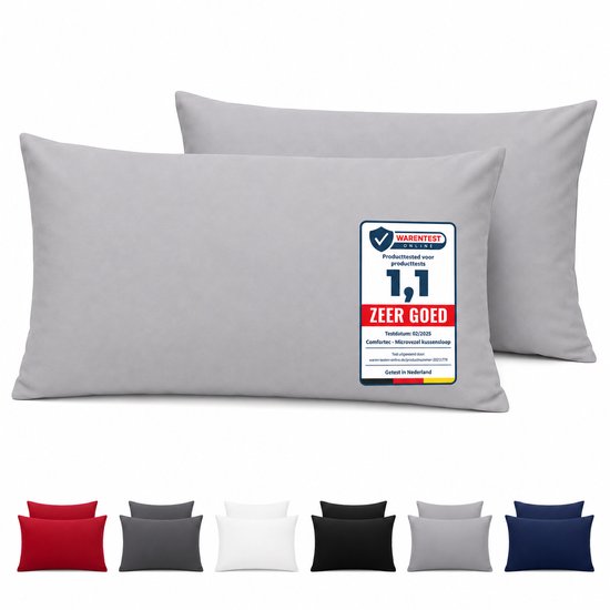 Deux oreillers gris clair avec une étiquette 'Très Bien' sur l'oreiller de droite. En dessous, des oreillers sont visibles en petit format en rouge, gris, blanc, noir, gris et bleu.