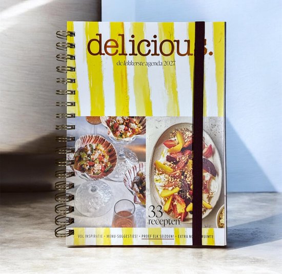 Agenda 2026 van Delicious, met gele strepen, een elastische sluiting en beelden van gerechten.