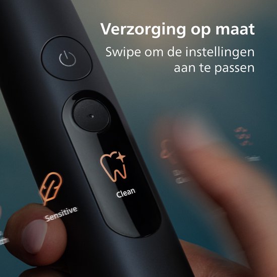 Dichtbij het display van een zwarte tandenborstel, met de 'Clean' en 'Sensitive' standen.