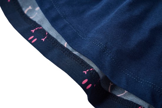 Gedetailleerde look van de naden van de donkerblauwe rok met roze smileyprint.