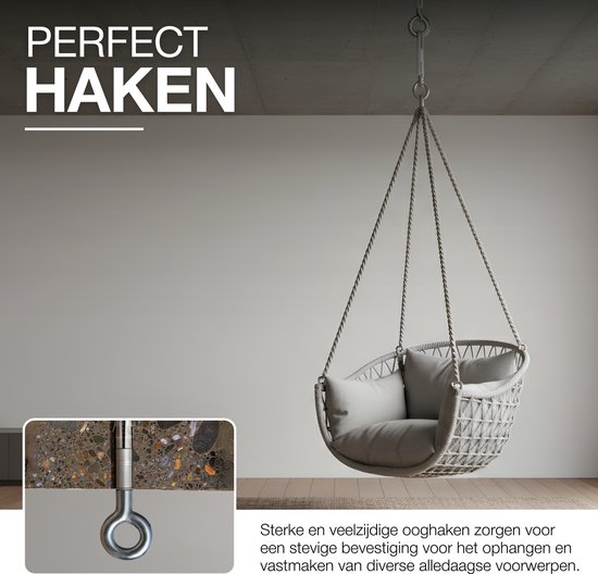 Hoge grijze schommelstoel hangt aan plafondhaak. Close-up van stevige bevestiging aan beton.