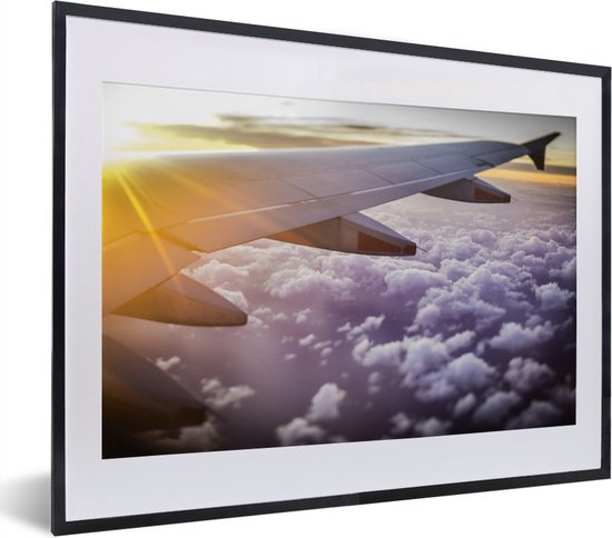 Zonnestralen langs een vliegtuig fotolijst zwart met witte passe-partout klein 40x30 cm - Foto print in lijst