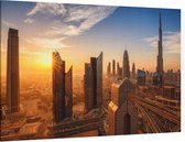 Skyline van Dubai met de Burj Khalifa bij zonsopgang - Foto op Canvas - 60 x 40 cm