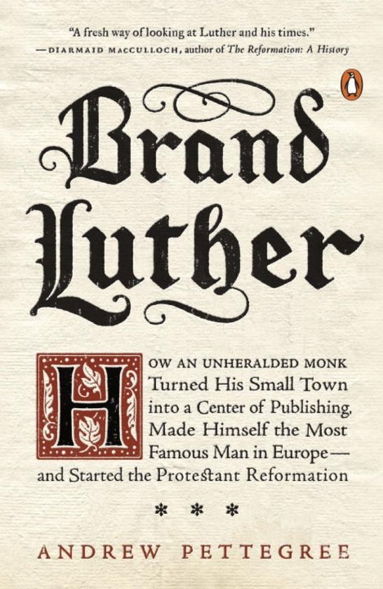 Boek 'Brand Luther' met sierlijke zwarte letters. Beschrijft hoe een monnik de Reformatie startte.