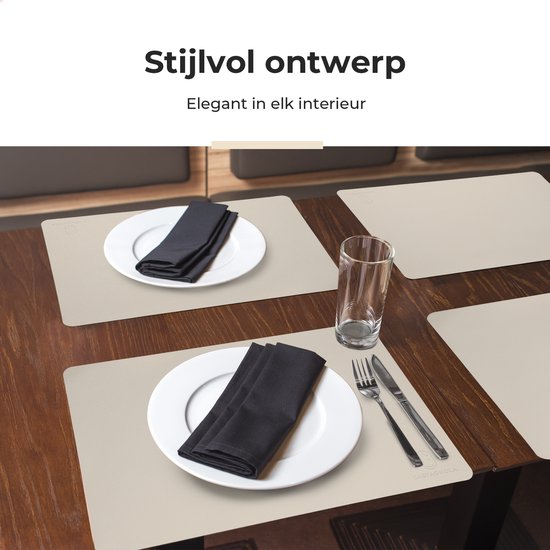 Tafel gedekt met offwhite placemats, borden, bestek en glazen.