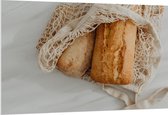 PVC Schuimplaat - Verse Broodjes in Gehaakt Tasje - 150x100 cm Foto op PVC Schuimplaat (Met Ophangsysteem)