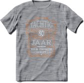 80 Jaar Legendarisch Gerijpt T-Shirt | Oranje - Grijs | Grappig Verjaardag en Feest Cadeau Shirt | Dames - Heren - Unisex | Tshirt Kleding Kado | - Donker Grijs - Gemaleerd - M