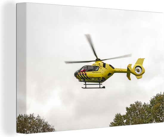 Canvas Schilderij Trauma helikopter in de lucht - 60x40 cm - Wanddecoratie