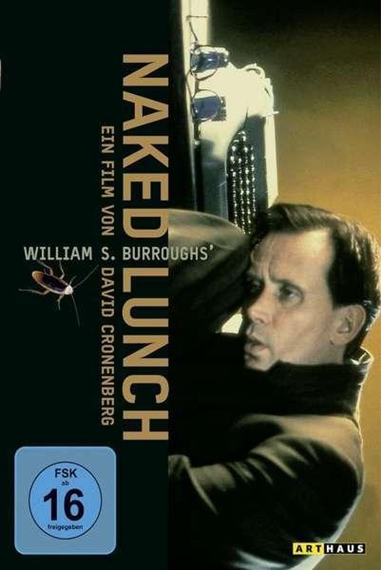 Een man staart naar de kijker, met een typemachine boven zijn hoofd. De titel 'NAKED LUNCH' staat verticaal naast de afbeelding.