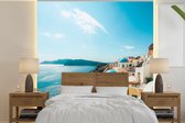 Behang - Fotobehang Middag in Santorini Griekenland - Breedte 350 cm x hoogte 350 cm