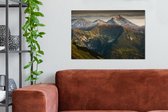 Canvas Schilderij Een donkere lucht boven het Nationaal Park Tatra in Slowakije - 90x60 cm - Wanddecoratie