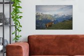 Canvas Schilderij Koe op de bergweide in het Nationaal park Hohe Tauern in Oostenrijk - 90x60 cm - Wanddecoratie