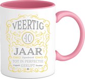 40 Jaar Legendarische Gebrouwen Mok met tekst | Geel - Zilver | Grappig Verjaardag Beker Cadeau | Bedrukte Mokken | Roze | 330 ML