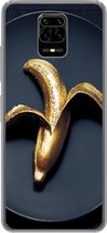 Geschikt voor Xiaomi Redmi Note 10 Lite hoesje - Gouden banaan op een donkere achtergrond - Siliconen Telefoonhoesje