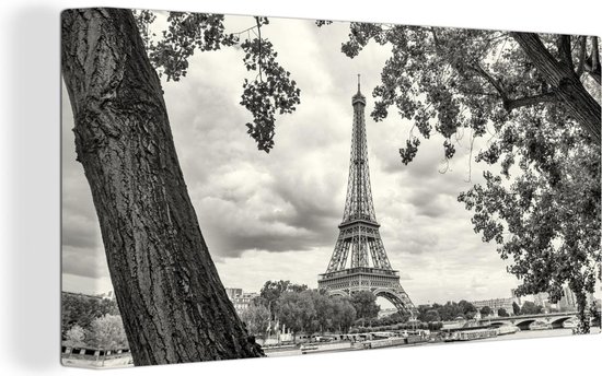 Canvas Schilderij Eiffeltoren door de bomen - 80x40 cm - Wanddecoratie