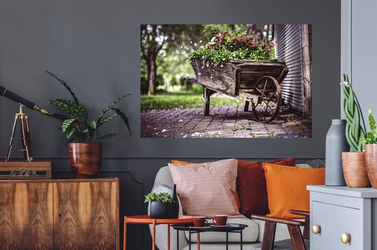 Sticker Muursticker Brouettes avec fleurs - brouette ancienne utilisée comme bac à fleurs - 120x80 cm - film autocollant - sticker mural repositionnable