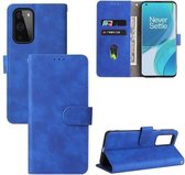 Voor OnePlus 9 Effen kleur Skin Feel Magnetische gesp Horizontale flip kalftextuur PU lederen hoes met houder & kaartsleuven & portemonnee (blauw)