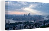 Canvas Schilderij Overzicht over de Chinese miljoenenstad Chongqing - 40x20 cm - Wanddecoratie