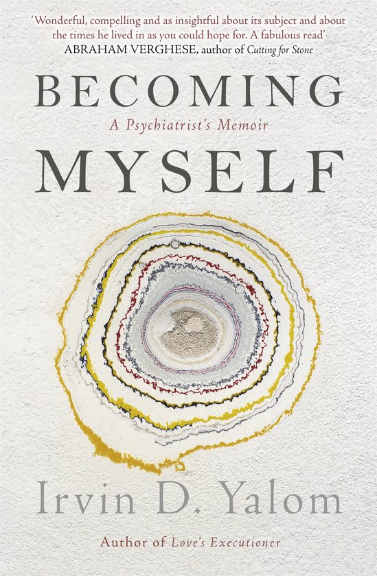 Boek 'Becoming Myself' met een gekleurde, gelaagde steenafbeelding op de voorkant, met tekst van Irvin D. Yalom.