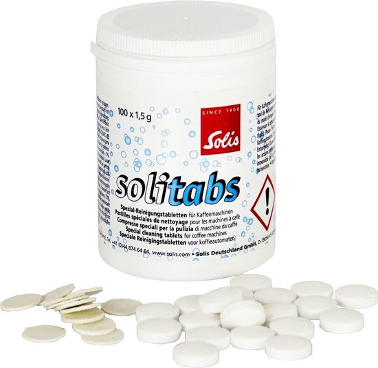 Pot met 100 Solitabs reinigingstabletten voor koffiemachines, met losse tabletten ernaast.