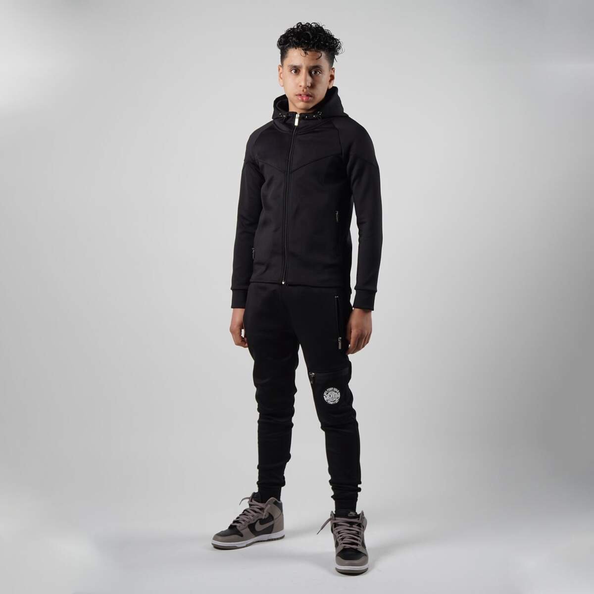 Joya Rush Trainingspak - Junior - Zwart