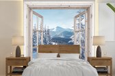 Behang - Fotobehang Doorkijk - Winter - Landschap - Natuur - Berg - Bomen - Wit - Breedte 350 cm x hoogte 350 cm