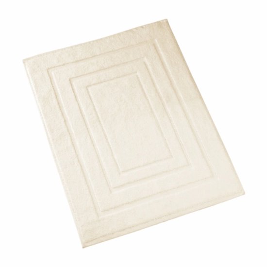 Tapis de bain couleur crème avec des motifs carrés concentriques en relief.