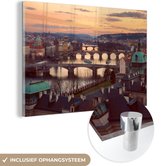 MuchoWow® Glasschilderij 30x20 cm - Schilderij acrylglas - Zonsondergang - Praag - Bruggen - Foto op glas - Schilderijen