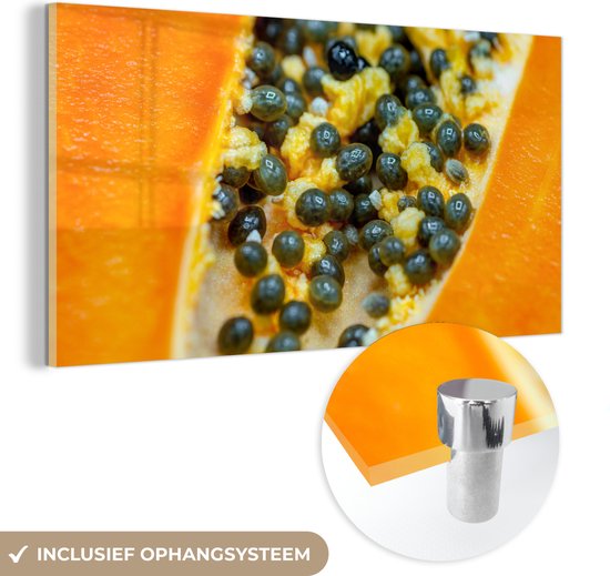 MuchoWow® Glasschilderij 160x80 cm - Schilderij acrylglas - Close-up van de zaden in de kern van een overheerlijke papaja vrucht - Foto op glas - Schilderijen