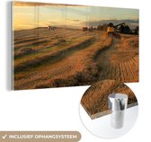 MuchoWow® Glasschilderij 120x60 cm - Schilderij acrylglas - Trekker - Zon - Wolken - Foto op glas - Schilderijen