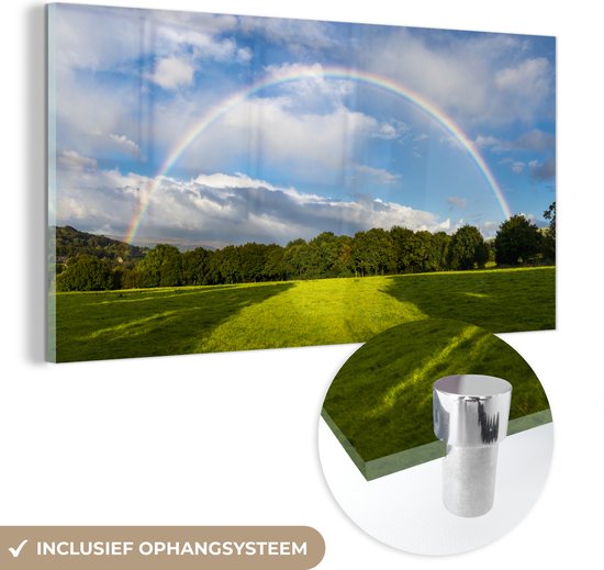 Glasschilderij - Een dubbele regenboog boven een grasveld - Acrylaat Schilderijen - Foto op Glas