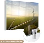 MuchoWow® Glasschilderij 90x60 cm - Schilderij glas - Windmolens in weilanden - Foto op acrylglas - Schilderijen