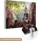MuchoWow® Glasschilderij 60x40 cm - Schilderij acrylglas - Boeddhabeeld bij een tempel in Thailand - Foto op glas - Schilderijen