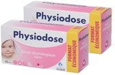 Twee pakken met roze en witte verpakking, met de tekst 'Physiodose Sérum physiologique Stérile'. Een baby gezicht is zichtbaar op de voorkant.