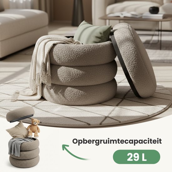 Open poef van grijze teddy stof met opbergruimte. Bevat een plaid, kussens en een teddybeer.