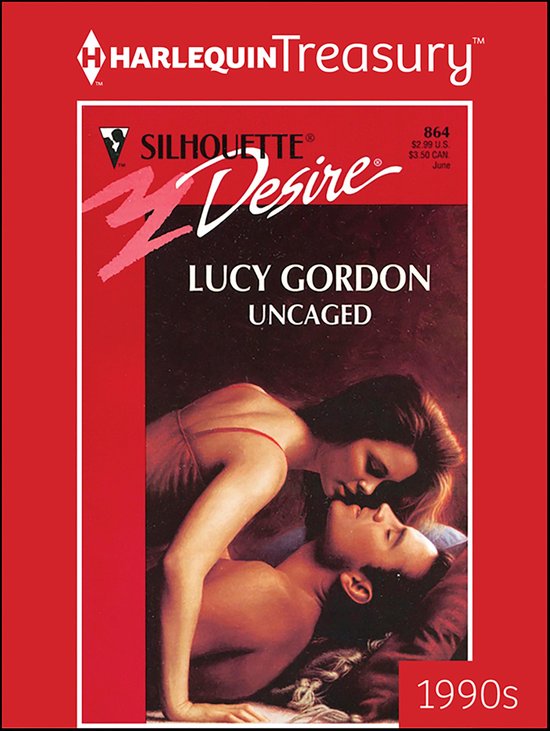 Boekcover van 'Uncaged' van Lucy Gordon, een Silhouette Desire roman uit juni 1990. Een vrouw kust een man op de mond, beiden met gesloten ogen.