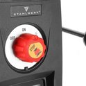 Gedetailleerde weergave van de rode noodstopknop 'STOP' op een boormachine.