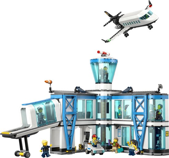 LEGO City luchthaven met vliegtuig en passagiers. Wit gebouw met blauwe accenten, toren en vliegtuig.
