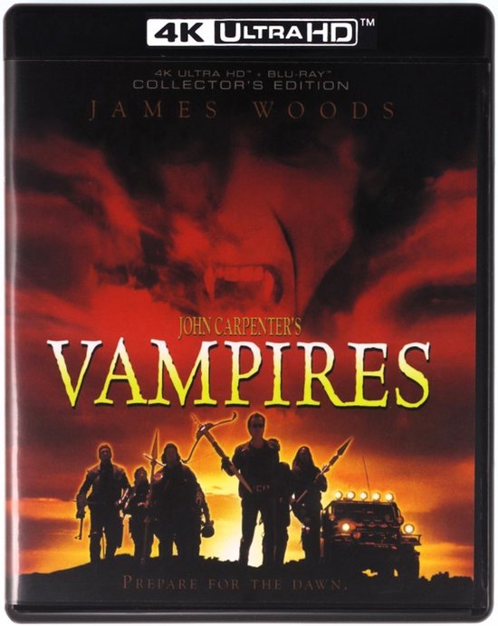 Promotionele poster voor John Carpenters Vampires: een groep vampierjagers staat tegen een oranje rode, dramatische hemel met een vampiergezicht.