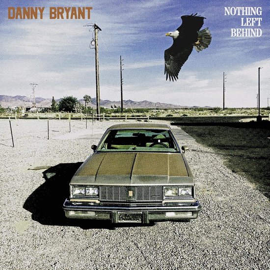 Danny Bryant Nothing Left Behind albumcover met een vintage auto en een vliegende arend.