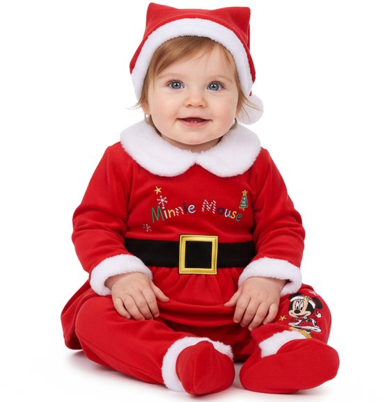 Baby in kerstmanpakje van Minnie Mouse, zittend met kerstmuts.