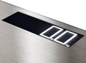 Close-up van het digitale display van een zilverkleurige weegschaal, '0.0' kg weergegeven.
