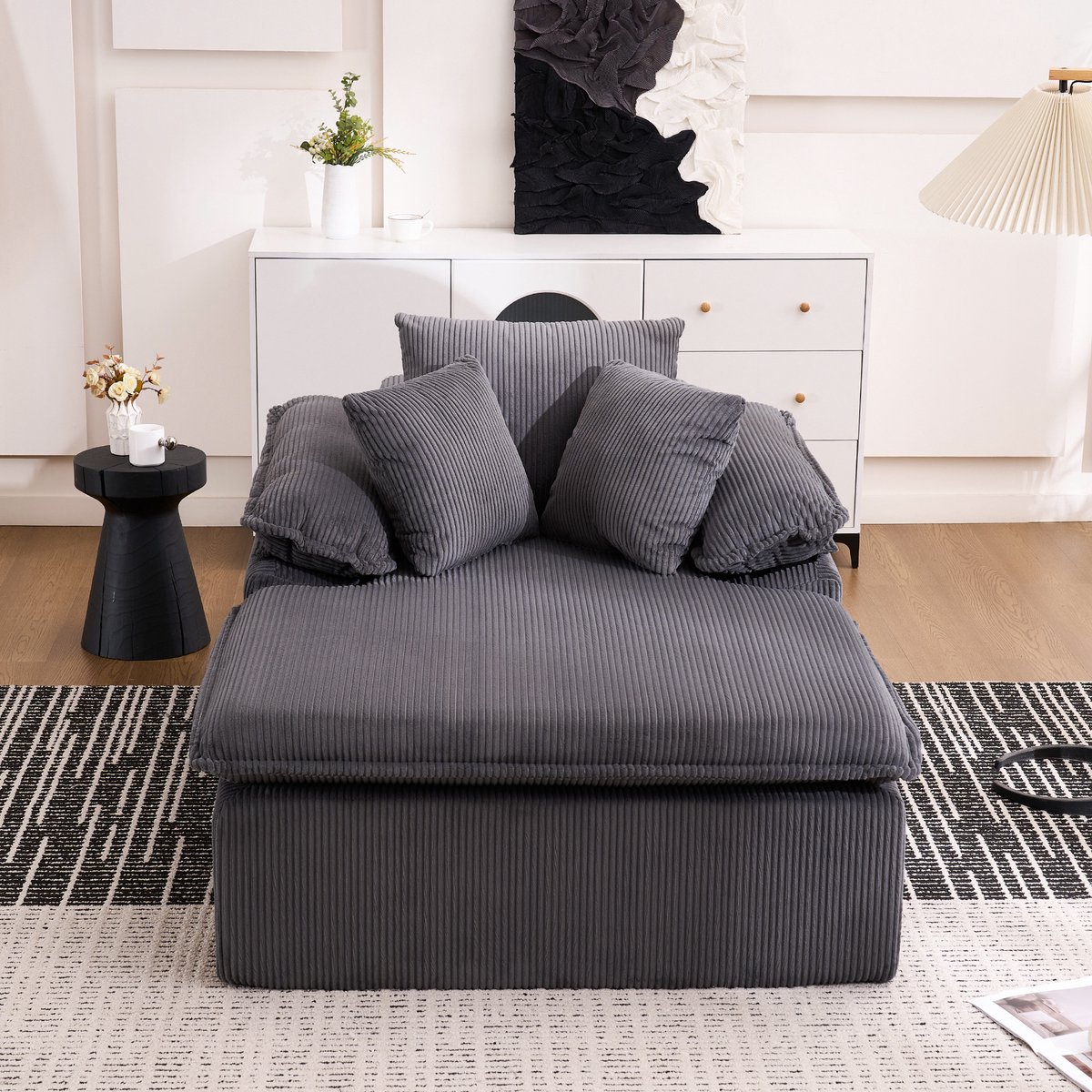 Een 46 cm hoge ligstoel/relaxfauteuil, ontworpen in een binnenhuissstijl, met een frameloos design. Een comfortabelere lees- en relaxfauteuil, uitgerust met brede armleuningen, geen montage nodig- Grijs