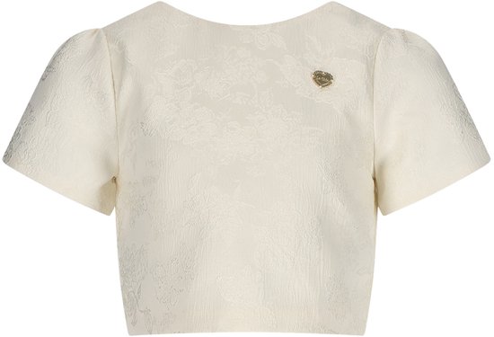 Crèmekleurige cropped blouse met korte pofmouwtjes en een ronde hals. Met stof met bloemenbroderie en een gouden speldje op de schouder.