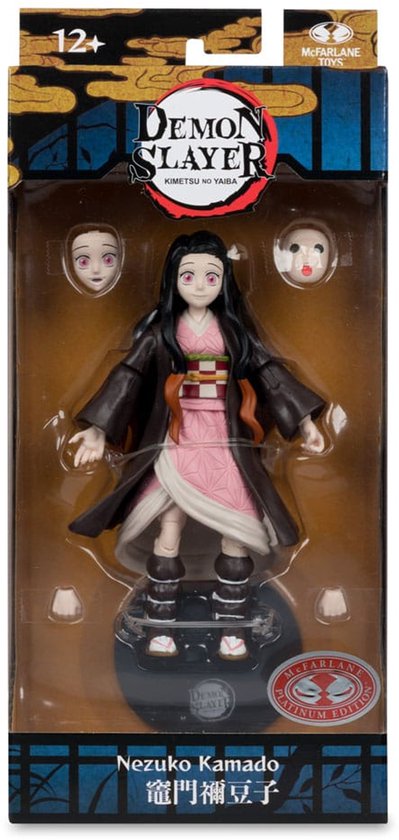 Actiefiguur van Nezuko Kamado in verpakking, met extra gezichten en handen. "Demon Slayer" logo prominent.