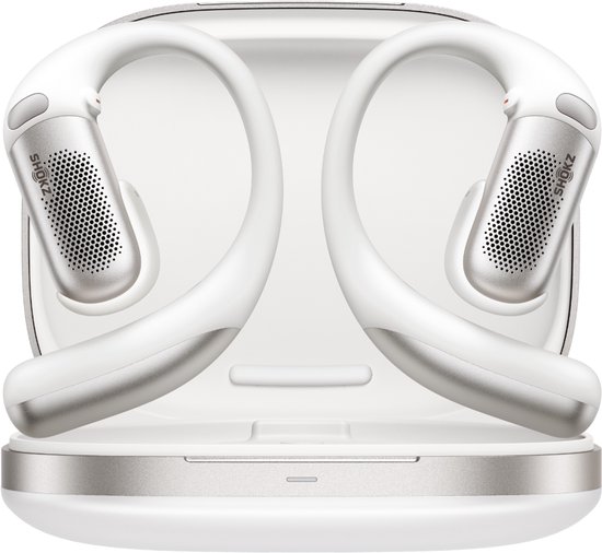 Witte Shokz OpenFit Pro oordopjes in de oplaadcase.