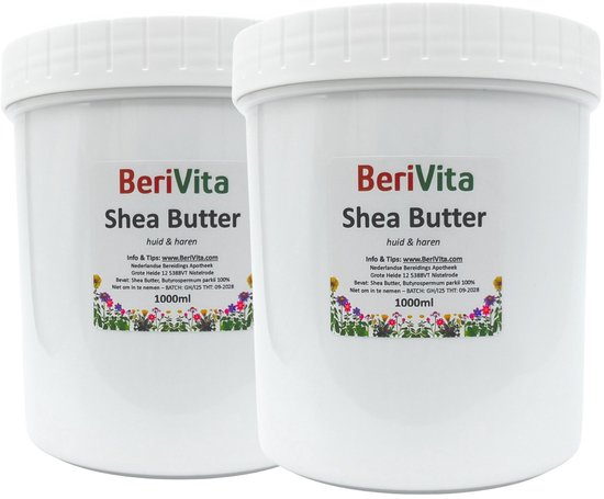 Twee grote witte potten met BeriVita Shea Butter, etiket met bloemen.