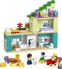 Maison Duplo avec cuisine, salle de bain et chambres, avec 4 figurines et un chariot.